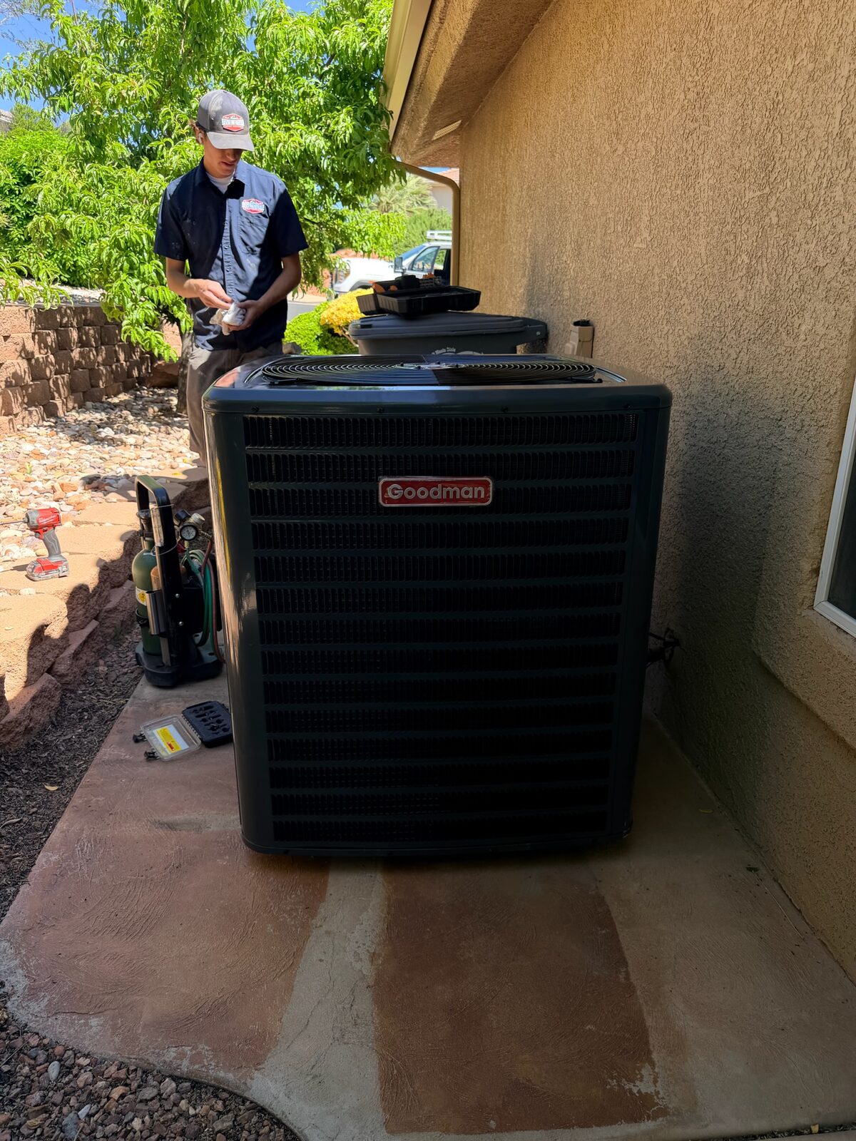 Five Star Mechanical technician servicing a Goodman air conditioning condenser in Las Vegas, NV
