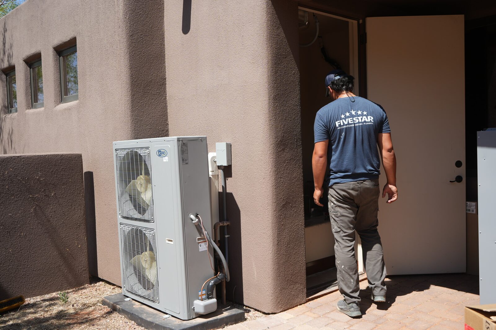 Five Star Mechanical technician installing an inverter HVAC system in Las Vegas, NV