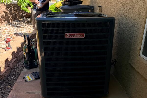 Five Star Mechanical technician servicing a Goodman air conditioning condenser in Las Vegas, NV