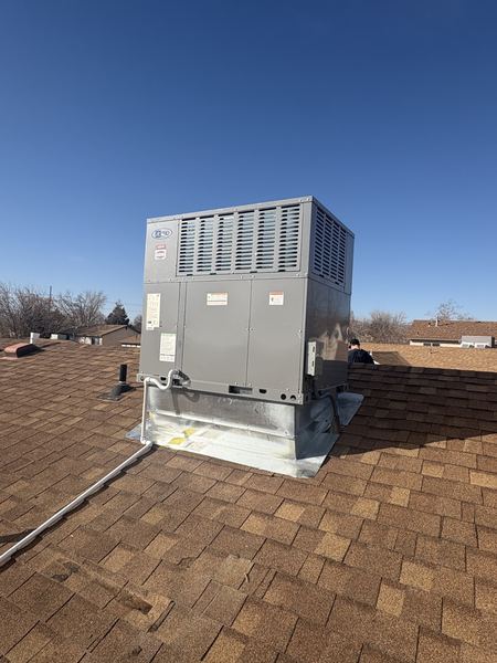 New AC Pro rooftop package unit installed on a Vegas-area home